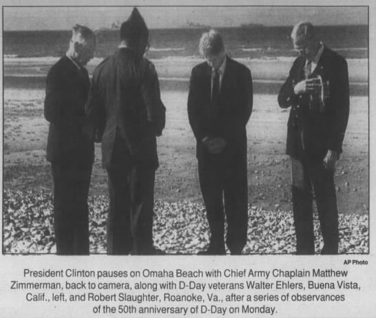President Clinton pauses on Omaha Beach